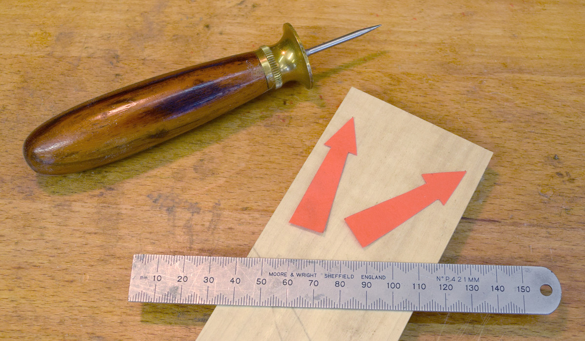 Marking out the half pins at the side with awl points