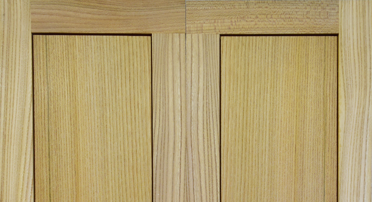 Elm doors, book matched frame and panel