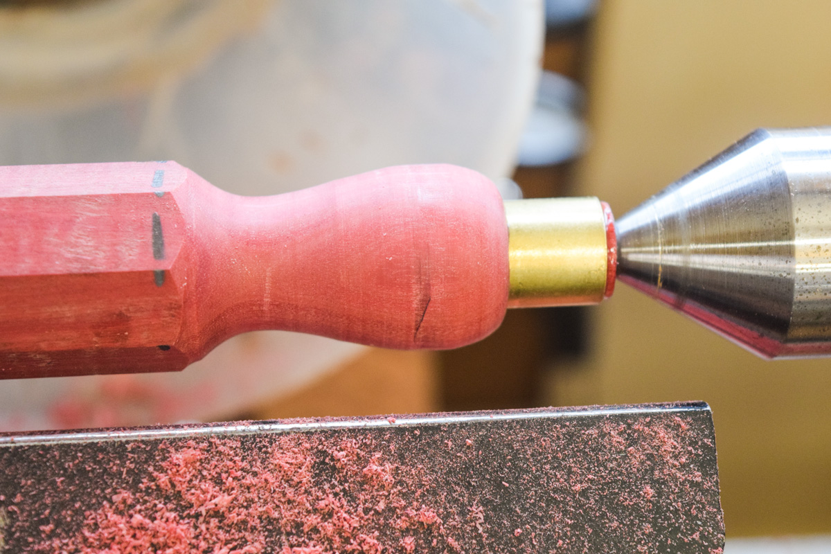 Turning the flared section of the handle