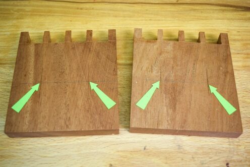 Two base sections of wood with 2 centre markings in each for screw holes.