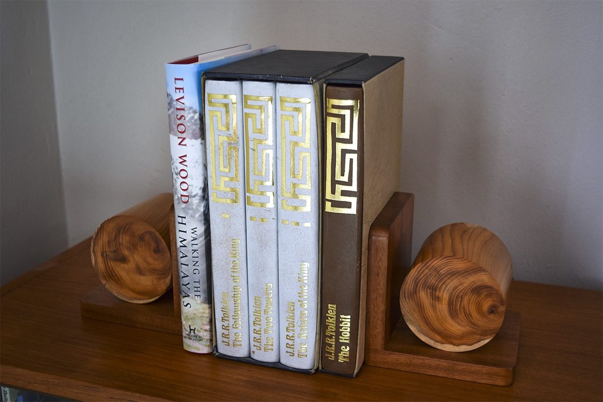 Completed bookends on the shelf with books stacked.