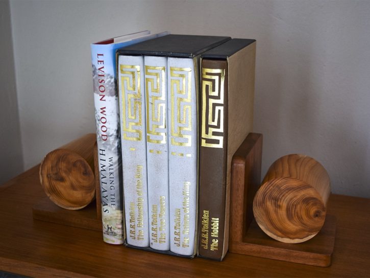 Completed bookends on the shelf with books stacked.