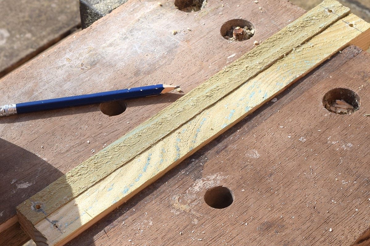 Drill 3.5mm pilot holes at each end