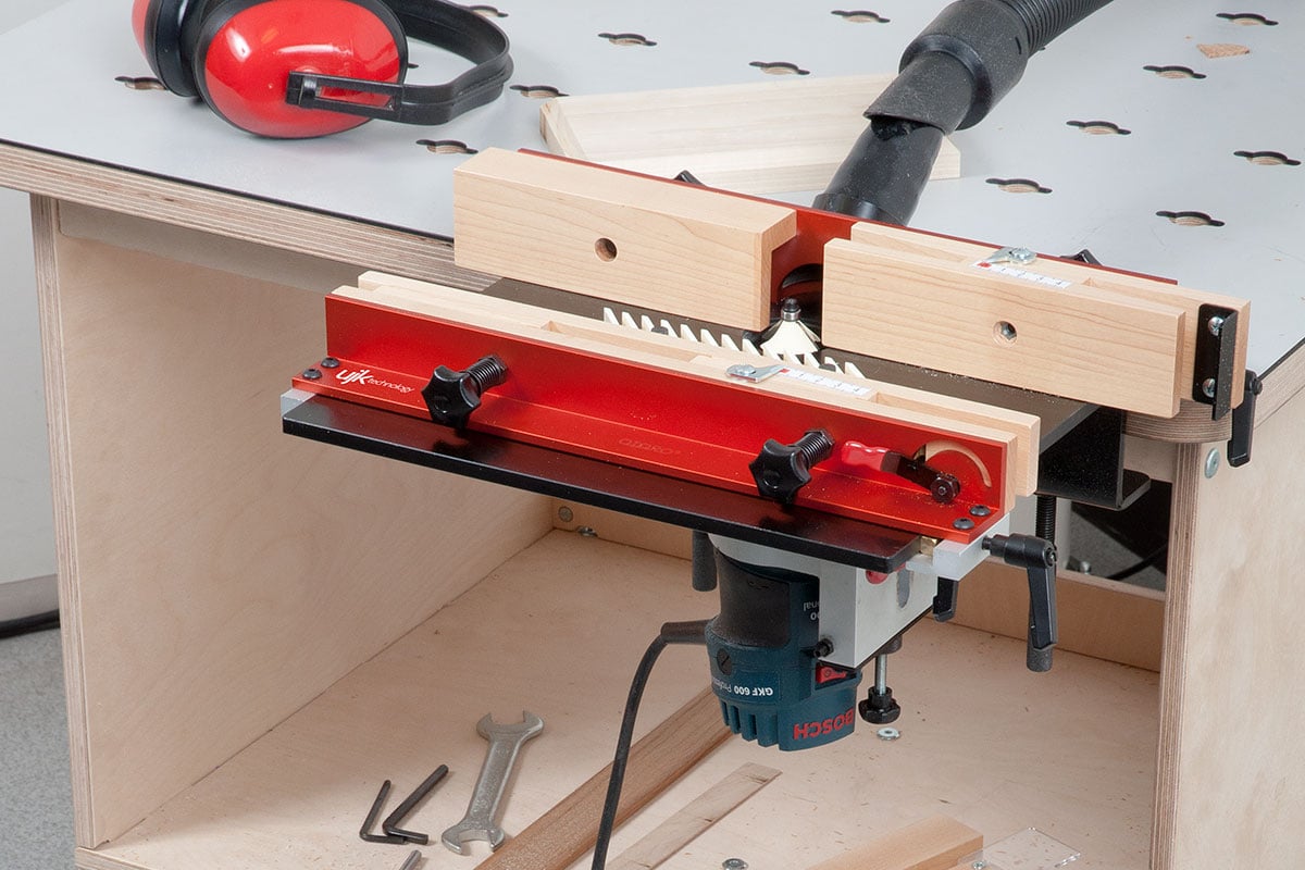 Router table clamped to a workbench