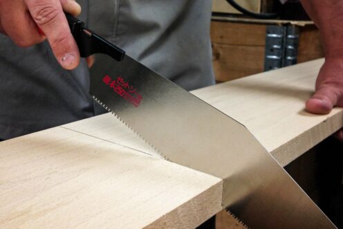 Cutting pieces to length using a crosscut saw