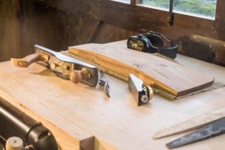 Wood planes on a workbench