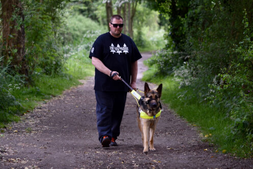 Chris with his guide dog