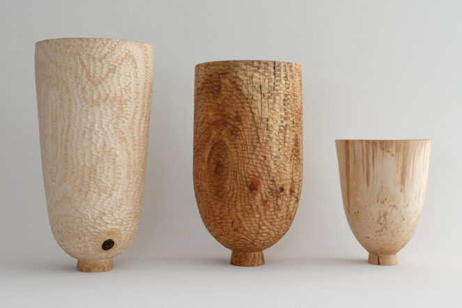 three turned vessels in exhibition