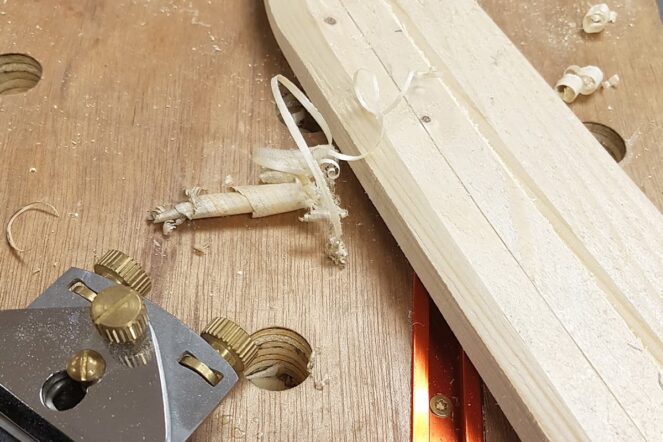 Using a spokeshave to shape the blade