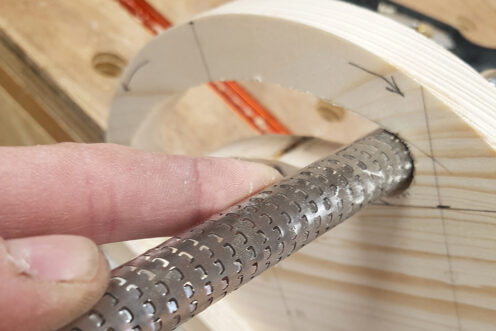 Smoothing the insider of the handle with a rasp