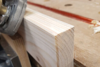 Use a low angle block plane to put small bevels on the outside faces of the rails