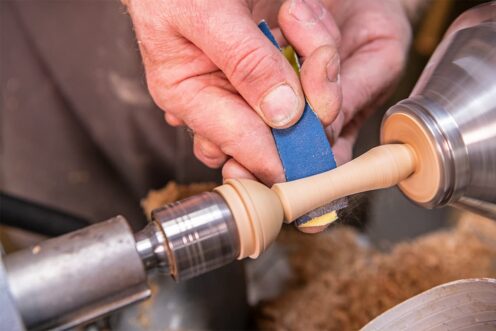 How to Turn a Wooden Baby Rattle - Shape the external surface of the base section