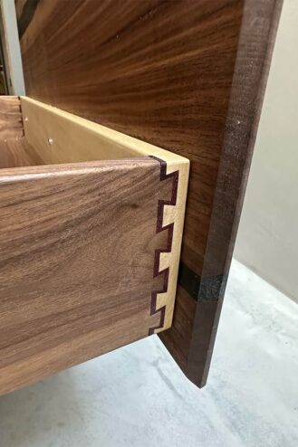 Hobby Winner: Calvin Lau (Floating walnut vanity cabinet for the family bathroom. Draw fronts: Walnut with black epoxy, double half blind dovetails. Draw boxes: Walnut, Purple Heart and Poplar)