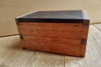 Junior Winner: Edmund Barber (Sapele and Walnut dovetail box with Ebony lid and a wooden hinge)