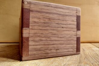 Junior Winner: Edmund Barber (Sapele and Walnut dovetail box with Ebony lid and a wooden hinge)