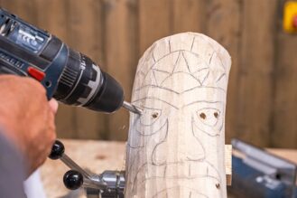 Attach the mask to the carving clamp