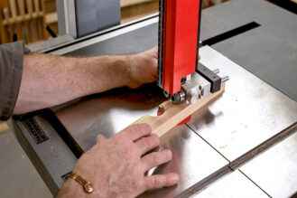 Removing the handle section using a bandsaw