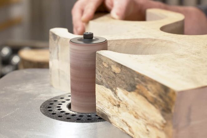 Sand the internal curves by hand or with a bobbin sander