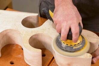 Use an orbital sander all over to achieve a smooth finish
